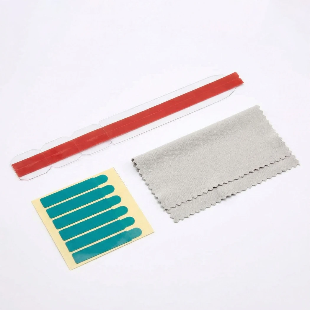 Image of the adhesive strips, holding tabs, and microfiber cloth