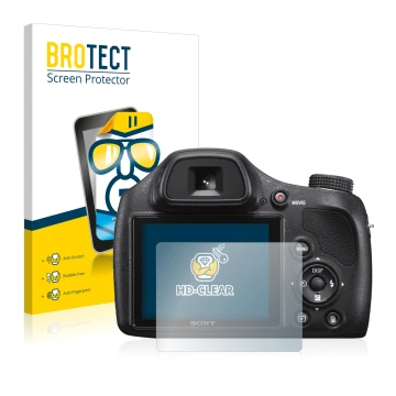 Front side of a product packaging with the brand logo BROTECT. Next to it is the device Sony Cyber-Shot DSC-H400 shown with th