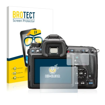 Front side of a product packaging with the brand logo BROTECT. Next to it is the device Pentax K-3 II shown with the correspon