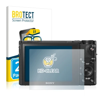 Front side of a product packaging with the brand logo BROTECT. Next to it is the device Sony Cyber-Shot DSC-RX100 V shown with