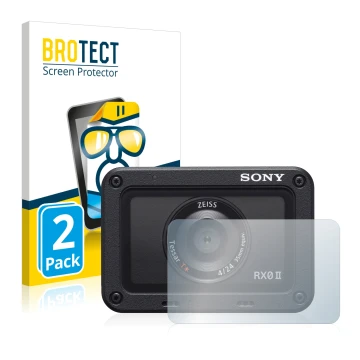 Front side of a product packaging with the brand logo BROTECT. Next to it is the device Sony DSC-RX0M2 (RX0 II) (Lens) shown w