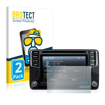 Front side of a product packaging with the brand logo BROTECT. Next to it is the device Volkswagen Amarok Discover Media 6.5