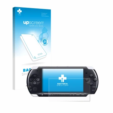 Front side of a product packaging with the brand logo upscreen. Next to it is the device Sony PSP 3000 shown with the correspo