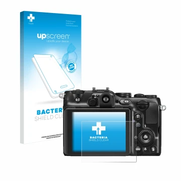 Front side of a product packaging with the brand logo upscreen. Next to it is the device Nikon Coolpix P7100 shown with the co