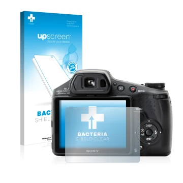 Front side of a product packaging with the brand logo upscreen. Next to it is the device Sony Cyber-Shot DSC-HX200V shown with