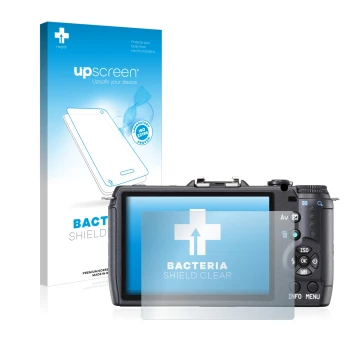 Front side of a product packaging with the brand logo upscreen. Next to it is the device Pentax Q10 shown with the correspondi