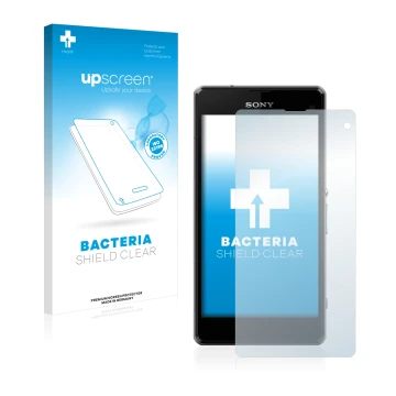 Front side of a product packaging with the brand logo upscreen. Next to it is the device Sony Xperia Z1 Compact D5503 shown wi