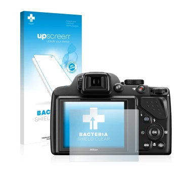 Front side of a product packaging with the brand logo upscreen. Next to it is the device Nikon Coolpix P530 shown with the cor