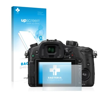Front side of a product packaging with the brand logo upscreen. Next to it is the device Panasonic Lumix DMC-GH4 shown with th