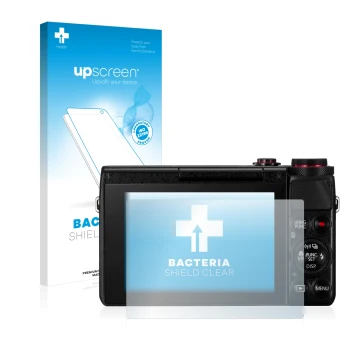 Front side of a product packaging with the brand logo upscreen. Next to it is the device Canon PowerShot G7 X G7X shown with t