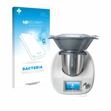 Front side of a product packaging with the brand logo upscreen. Next to it is the device Vorwerk Thermomix TM5 shown with the 