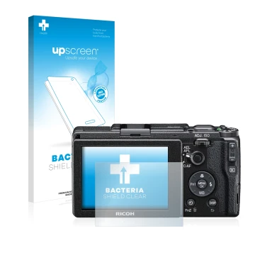 Front side of a product packaging with the brand logo upscreen. Next to it is the device Ricoh GR II 2015 shown with the corre
