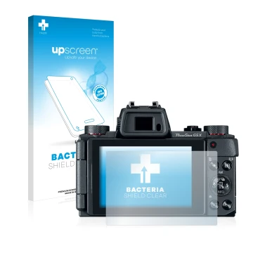 Front side of a product packaging with the brand logo upscreen. Next to it is the device Canon PowerShot G5 X shown with the c