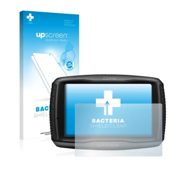 Front side of a product packaging with the brand logo upscreen. Next to it is the device Garmin zumo 595LM shown with the corr