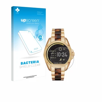 Front side of a product packaging with the brand logo upscreen. Next to it is the device Michael Kors Access Bradshaw shown wi