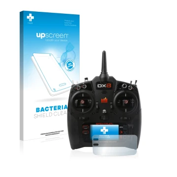 Front side of a product packaging with the brand logo upscreen. Next to it is the device Spektrum DX8 G2 shown with the corres