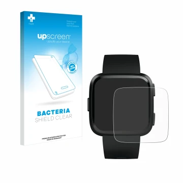 Front side of a product packaging with the brand logo upscreen. Next to it is the device Fitbit Versa shown with the correspon