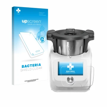 Front side of a product packaging with the brand logo upscreen. Next to it is the device SilverCrest Monsieur Cuisine Connect 