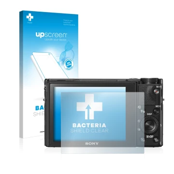 Front side of a product packaging with the brand logo upscreen. Next to it is the device Sony Cyber-Shot DSC-RX100 VI shown wi