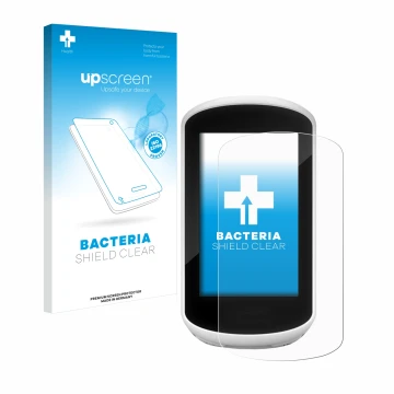 Front side of a product packaging with the brand logo upscreen. Next to it is the device Garmin Edge Explore 2018 shown with t