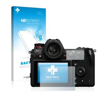 Front side of a product packaging with the brand logo upscreen. Next to it is the device Panasonic Lumix DC-S1R shown with the