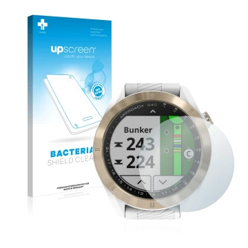 Front side of a product packaging with the brand logo upscreen. Next to it is the device Garmin Approach S40 shown with the co