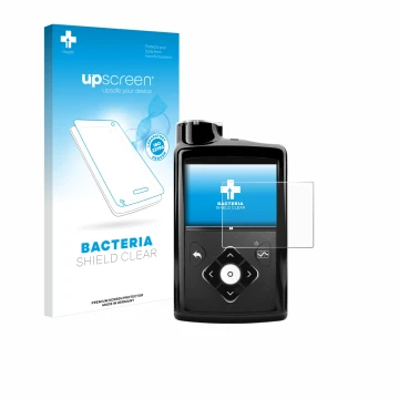 Front side of a product packaging with the brand logo upscreen. Next to it is the device Medtronic Minimed 670G shown with the