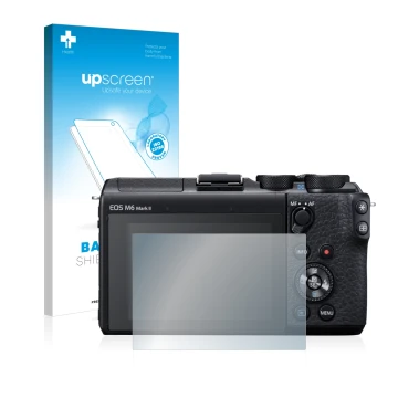 Front side of a product packaging with the brand logo upscreen. Next to it is the device Canon EOS M6 Mark II shown with the c