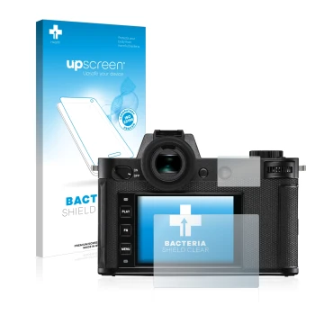 Front side of a product packaging with the brand logo upscreen. Next to it is the device Leica SL2 shown with the correspondin