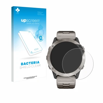 Front side of a product packaging with the brand logo upscreen. Next to it is the device Garmin quatix 6x Solar shown with the