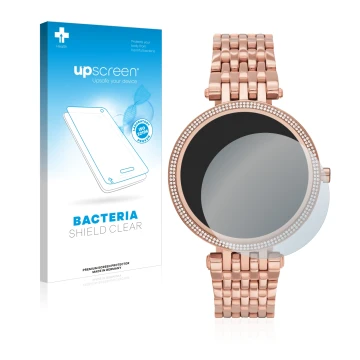 Front side of a product packaging with the brand logo upscreen. Next to it is the device Michael Kors Access Darci Gen 5E show