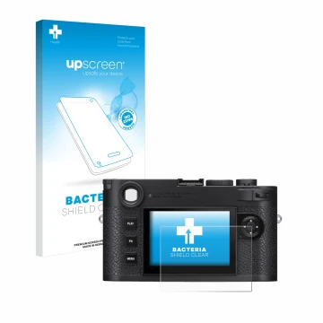 Front side of a product packaging with the brand logo upscreen. Next to it is the device Leica M11 shown with the correspondin