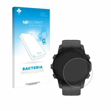 Front side of a product packaging with the brand logo upscreen. Next to it is the device Garmin Descent G1 shown with the corr