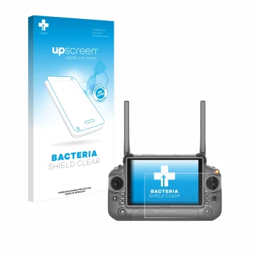 Front side of a product packaging with the brand logo upscreen. Next to it is the device DJI RC Plus shown with the correspond