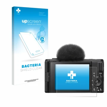 Front side of a product packaging with the brand logo upscreen. Next to it is the device Sony ZV-1F shown with the correspondi