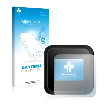 Front side of a product packaging with the brand logo upscreen. Next to it is the device Netgear Nighthawk M6 Pro shown with t