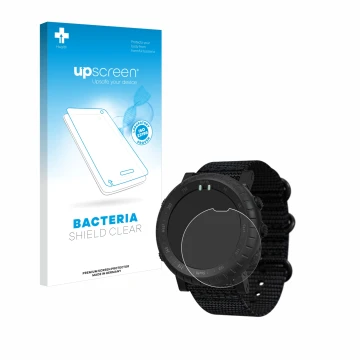 Front side of a product packaging with the brand logo upscreen. Next to it is the device Suunto Core Alpha shown with the corr