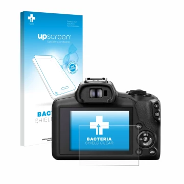 Front side of a product packaging with the brand logo upscreen. Next to it is the device Canon EOS R100 shown with the corresp