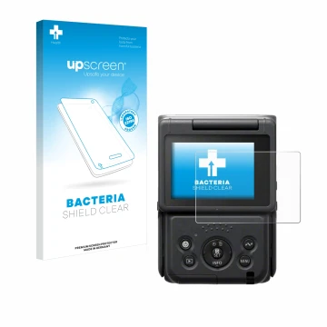 Front side of a product packaging with the brand logo upscreen. Next to it is the device Canon PowerShot V10 Vlog Camera shown