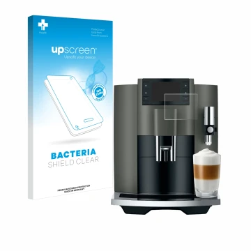 Front side of a product packaging with the brand logo upscreen. Next to it is the device Jura E8 (EC) shown with the correspon