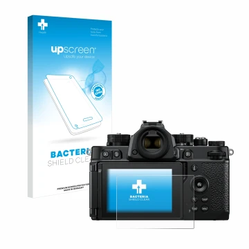 Front side of a product packaging with the brand logo upscreen. Next to it is the device Nikon Z F shown with the correspondin