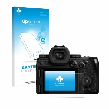 Front side of a product packaging with the brand logo upscreen. Next to it is the device Panasonic Lumix DC-S5M2X shown with t