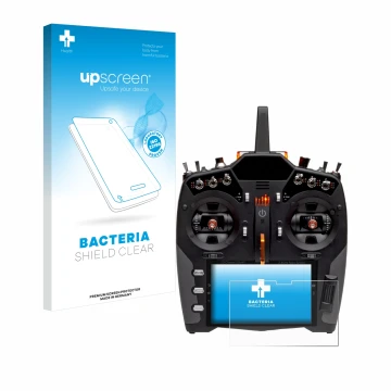 Front side of a product packaging with the brand logo upscreen. Next to it is the device Spektrum NX20 shown with the correspo
