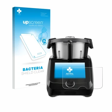 Front side of a product packaging with the brand logo upscreen. Next to it is the device SilverCrest Monsieur Cuisine Smart BL