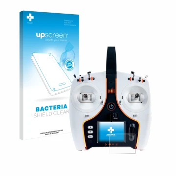 Front side of a product packaging with the brand logo upscreen. Next to it is the device Spektrum NX7e shown with the correspo