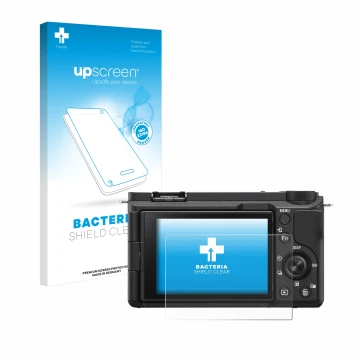 Front side of a product packaging with the brand logo upscreen. Next to it is the device Sony Alpha ZV-E10 II shown with the c