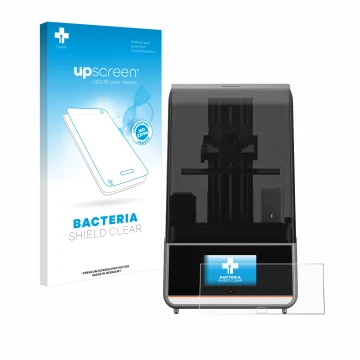Front side of a product packaging with the brand logo upscreen. Next to it is the device Anycubic Photon Mono M7 Pro shown wit