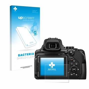 Front side of a product packaging with the brand logo upscreen. Next to it is the device Nikon Coolpix P1100 shown with the co