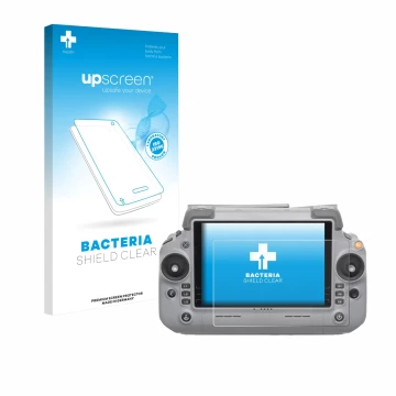 Front side of a product packaging with the brand logo upscreen. Next to it is the device DJI RC Plus 2 shown with the correspo