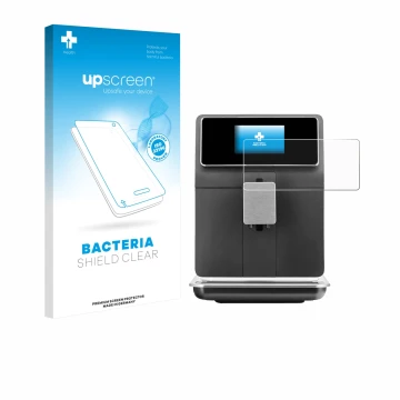 Front side of a product packaging with the brand logo upscreen. Next to it is the device WMF Perfection 860L shown with the co